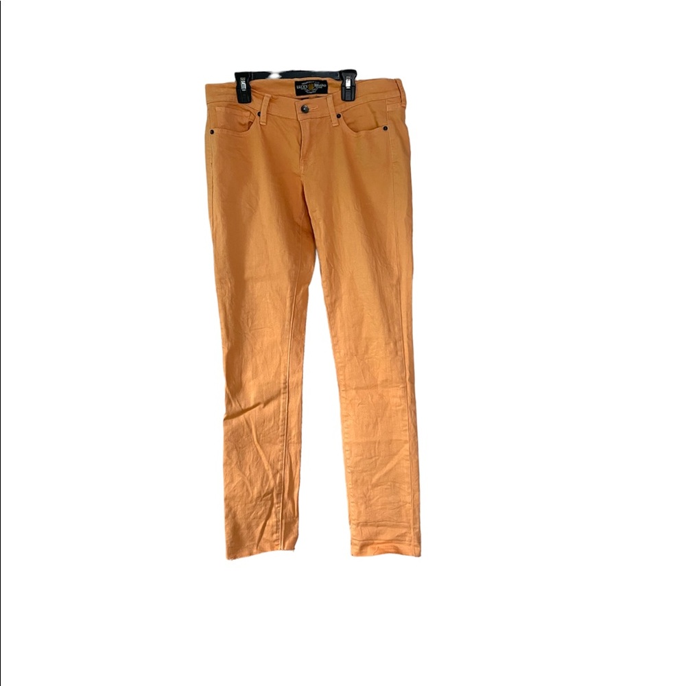 Lucky Brand Charlie Skinny jeans in an orange sorbet color